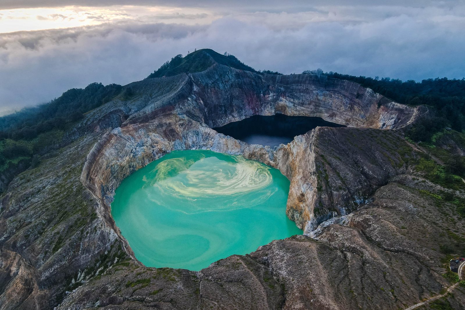 Aerial view of Kelimutu's three coloured volcanic lakes, 30 minutes from The Geckos Homestay in Moni, Flores